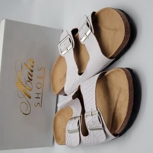 Mata Size 11 women's slip on sandal in white